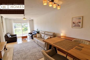 FULLY FURNISHED FRONTLINE GOLF APARTMENT WITH LARGE TERRACE BEAUTIFUL VIEWS - POOL AND A GARAGE