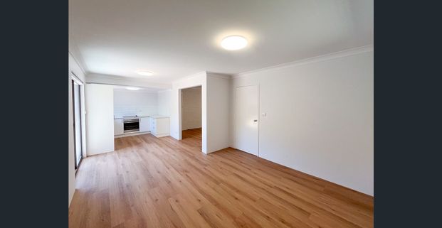 SPACIOUS THREE BEDROOM TOWNHOUSE IN A GATED COMPLEX - Photo 1