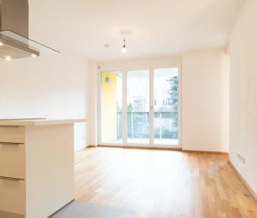 Balkonwohnung mit Blick in den grünen Innenhof im 21. Bezirk! - Photo 1