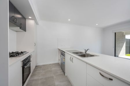 Charming 3-Bedroom Unit in Quiet Greta Location - Photo 2