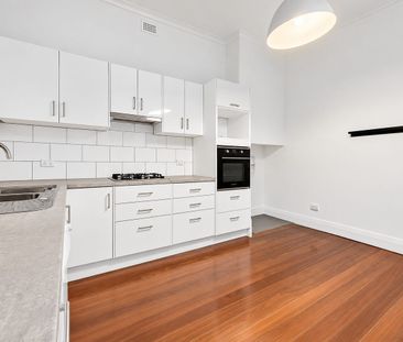 Spacious Three-Bedroom Home with Generous Backyard - Photo 6