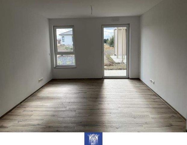 Wohlfühlwohnung mit Terrasse und moderner Ausstattung im Erstbezug! Rollstuhlgerecht! - Photo 1