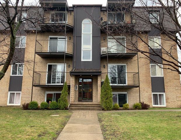 LAPRAIRIE, 4 1/2 style condo a louer pres services et transpor - Photo 1