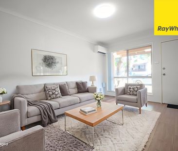 UPDATED STREET-FACING TOWNHOUSE WITH SPACE, STYLE & CONVENIENCE - Photo 1