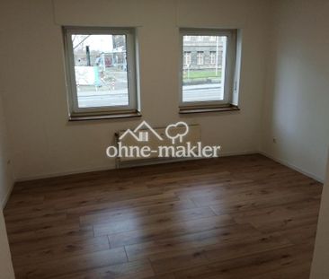 Renovierte Erdgeschosswohnung mit Einbauküche - Foto 1