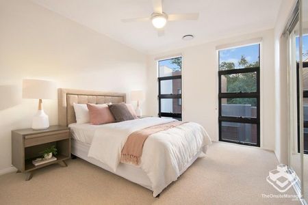 Spacious 4-Bedroom Townhome with Quality Finishes - Photo 3