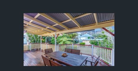 Renovated Highset Queenslander with Deck & Dual Living Areas - Moments From The Waterfront - Photo 5