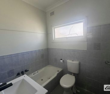 Rural home in the heart of town - Photo 1