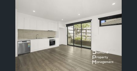 Luxurious Townhouse Living with Cutting-Edge Features - Photo 5