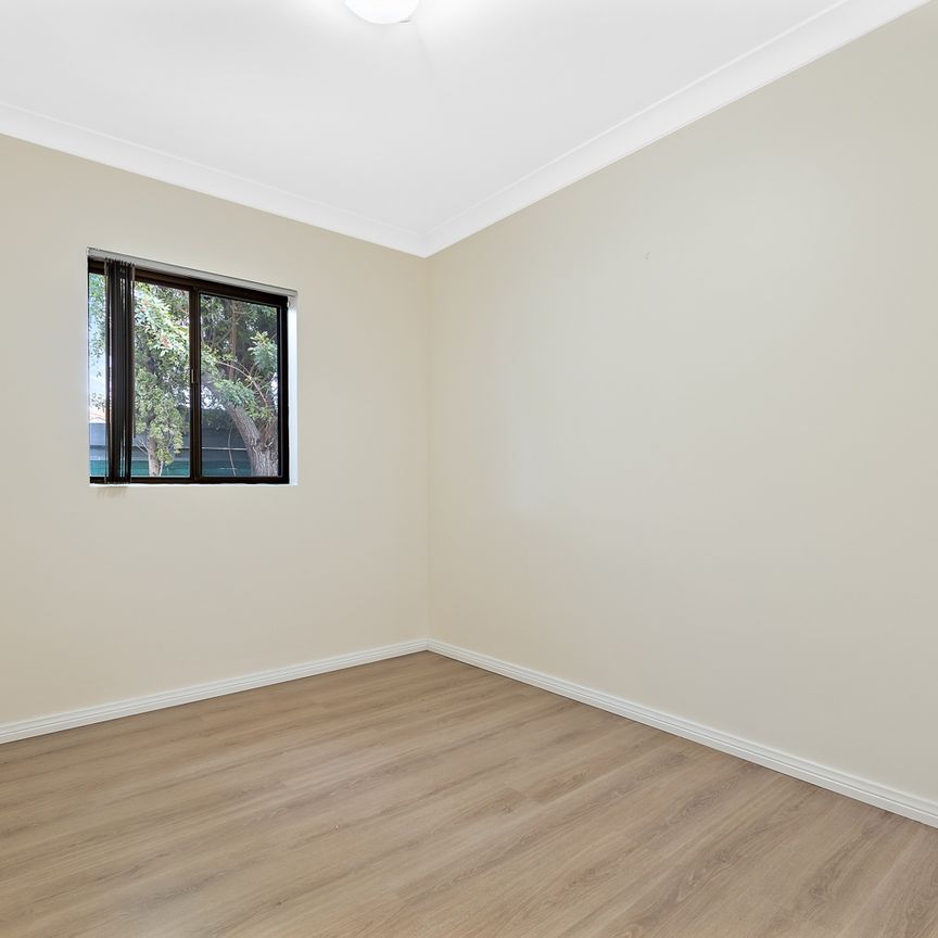 Bright & Spacious 4-Bedroom! - Photo 1