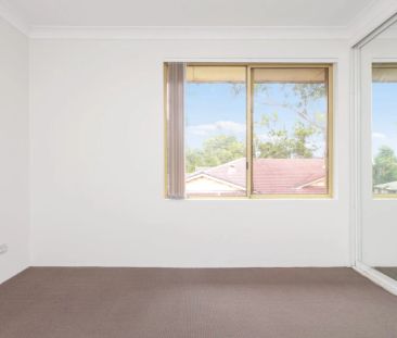 Top-Floor Unit – Your Peaceful Escape Awaits! - Photo 2