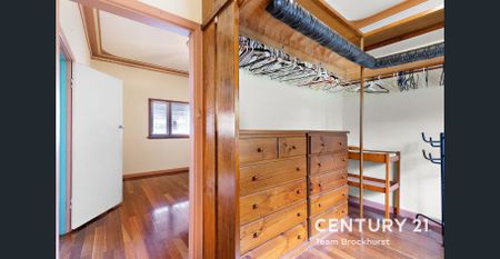 Charming 1950s Home with Modern Flexibility & Pristine Gardens! - Photo 4