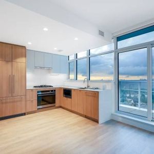 Luxury Sub-Penthouse | 2 Bed, 2 Bath + 2 Parking | Stunning Views - Photo 2