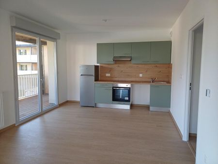location Appartement T3 DE 68.4m² À RAMONVILLE - Photo 3