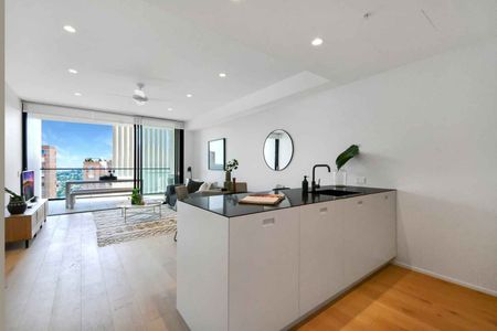 BEAUTIFULLY APPOINTED NORTH FACING APARTMENT WITH PARKING - Photo 2