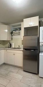 Fully furnished 1 bed/1den/1bath private basement suite - Photo 3