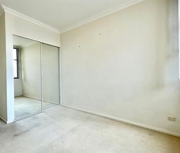 Sun-Filled and Spacious Apartment with Secure Undercover Parking - Photo 3