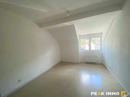 SAINT-CERGUES Appartement T2 avec stationnement couvert et - Photo 2