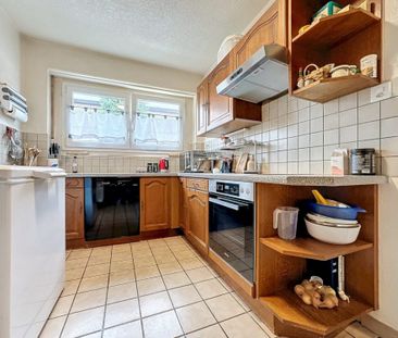 Appartement rafraîchi de 2,5 pces au rez - Photo 1