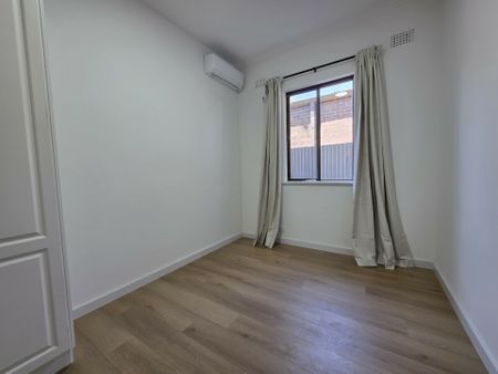 Fully Renovated Home with Stunning City Views - Photo 4