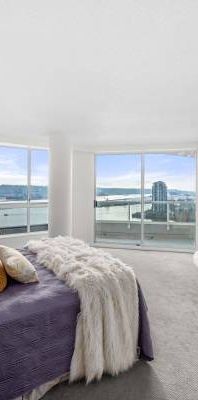 "Home in the Sky" Penthouse Apartment | Renovated 2 bed + den | 3 bath - Photo 1