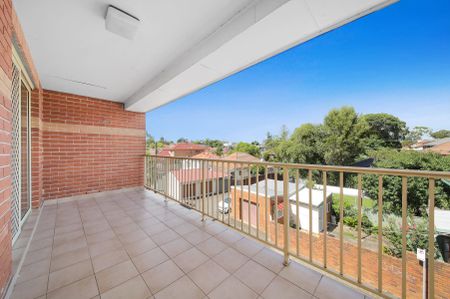 UPDATED MODERN UNIT IN POPULAR SECURITY COMPLEX - Photo 5