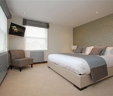 A smart spacious two bedroom flat on the 8th floor of this well run... - Photo 5
