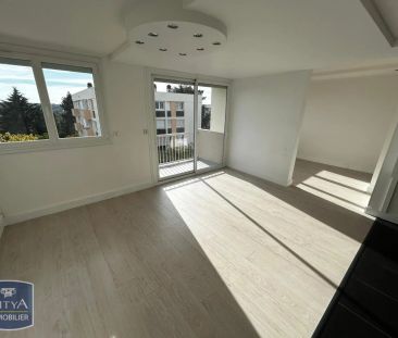 Appartement à louer 4 pièces 65.96m² - Photo 2