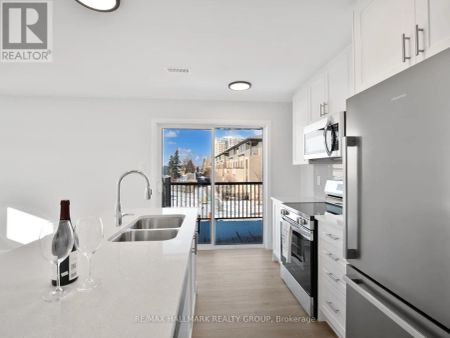 7 - 301 GLENROY GILBERT DRIVE - Photo 2