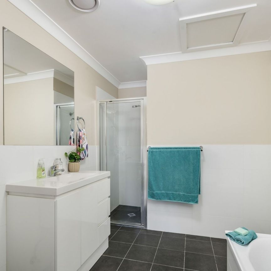 Spacious Townhouse Living with Private Courtyard - Photo 1