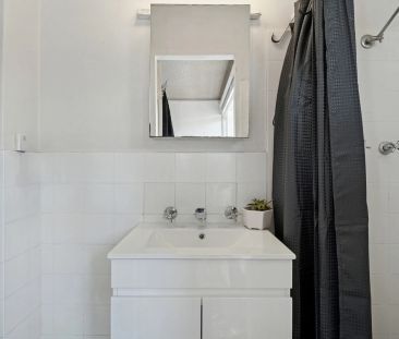 Updated Convenient Studio with Rooftop Pool | Furnished - Photo 3