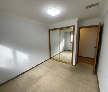 Spacious Family Living with Beautiful Gardens & Ample Storage - Photo 2