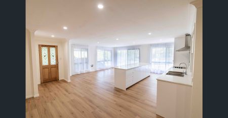 Spacious & Recently Renovated 5-Bedroom Home on acreage - Photo 4