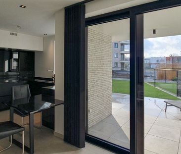 Gelijkvloers nieuwbouwappartement met 2 slaapkamers op exclusieve l... - Foto 1