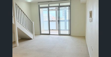 Stylish 2-Bedroom Apartment in the Heart of Burwood - Photo 5