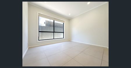 Modern Family Home in Jordan Springs East | 4 Bedrooms + Study + Double Garage - Photo 4