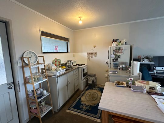 This delightful 1-bedroom unit - Photo 1