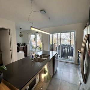 Grand appartement 4 1/2 sur 2 étages - Photo 2
