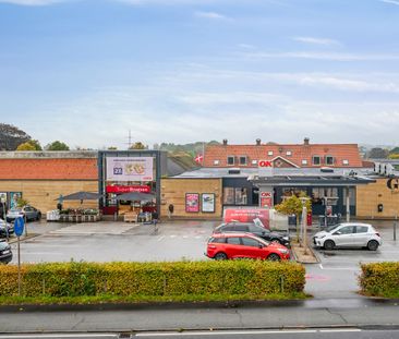 Nyistandsat 4-vær stuelejlighed med parkering og adgang til have - Photo 1