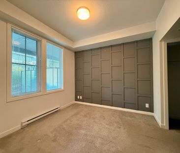 1 Bdrm + Den at Central Green w/ Patio & Greenspace - Photo 1