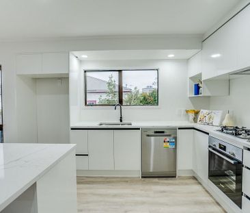 Beautiful 4 Bedroom with Garage and Storage Room - Photo 3