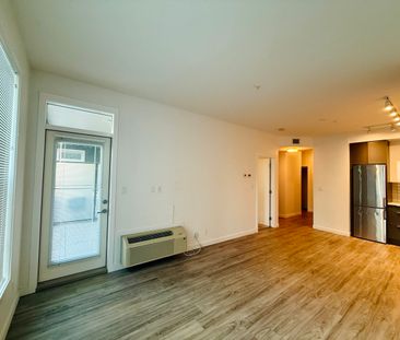 1 Bdrm + Den at Central Green w/ Patio & Greenspace - Photo 5