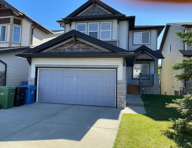 Fabulous 2 story walk-out home in the desirable springbank hill community | 11 Cortina Way Southwest, Calgary - Photo 1