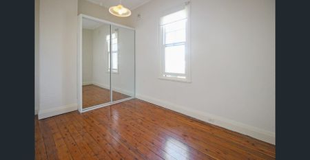Charming Family Apartment in Convenient Location - Photo 3