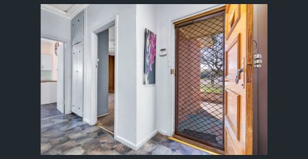 Charming 3-Bedroom Home with Spacious Yard in Elizabeth Downs - Photo 5