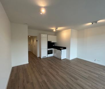 Modern appartement met zonnig terras en autostaanplaats - Photo 3