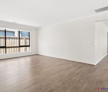 Light-Filled Four-Bedroom Home Designed for Easy Family Living - Photo 2