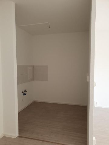 Gemütliche 2,5-Raum-Wohnung mit Balkon! - Foto 4