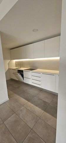 Moderno appartamento 2.5 locali con terrazza e giardino privato a Pazzallo - Photo 4
