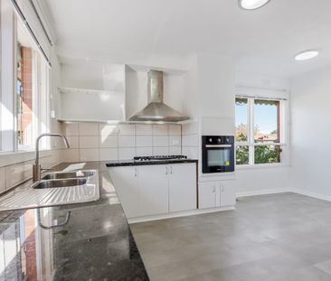 Convenience Meets Comfort in This Three Bedroom Home - Photo 4